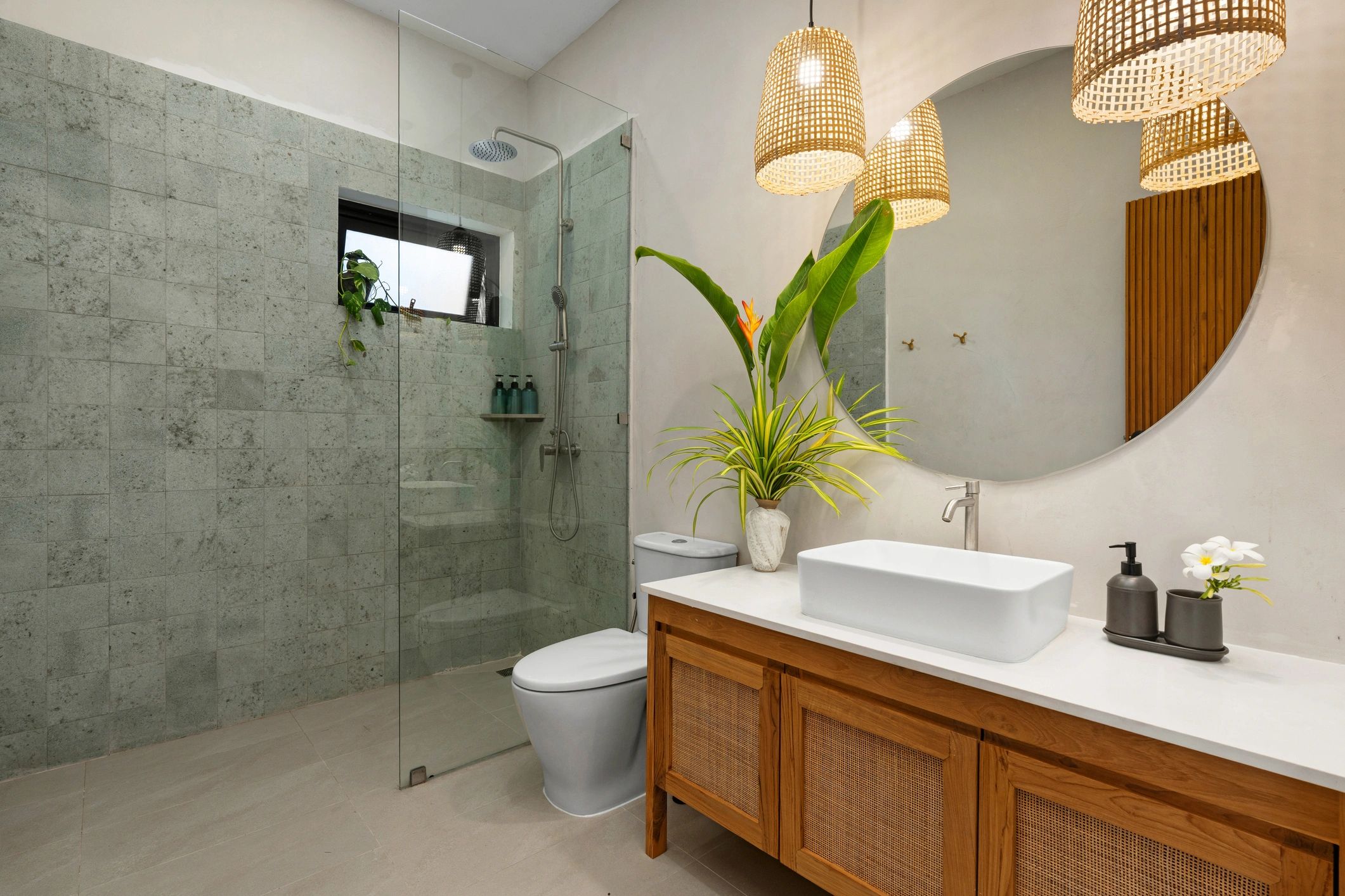Luxury modern bathroom with double vanity, walk-in shower, and expansive window view